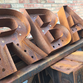 3d rusty shop metal letters