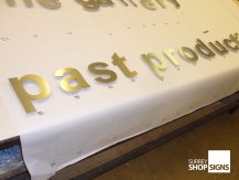past production brushed gold all letters